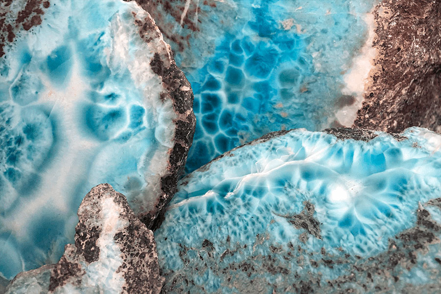 Cuts of Larimar stones. Deep blue marbling can be made into high quality Larimar jewelry.